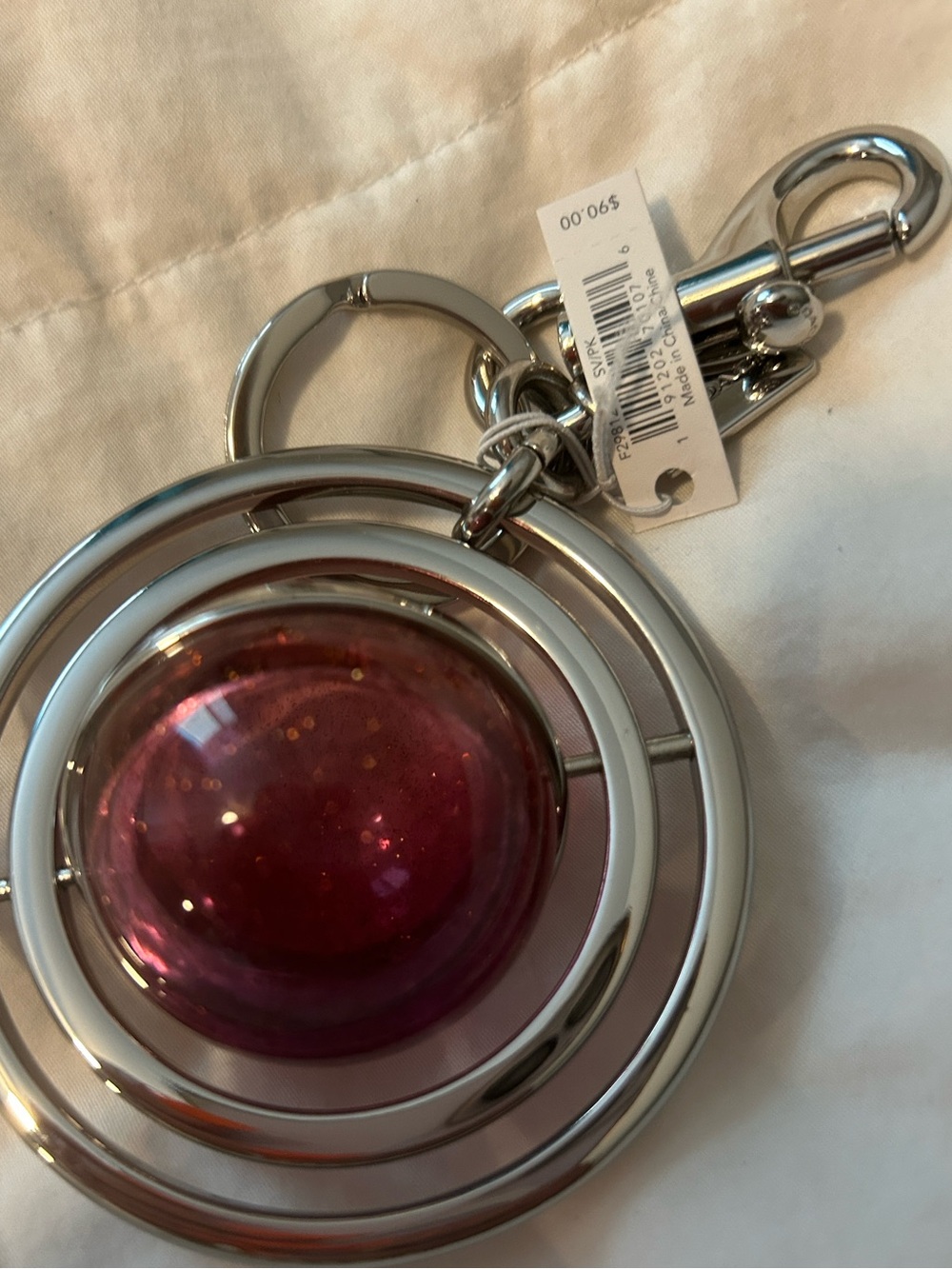 Coach Silver Keychain with Pink Glitter Orb